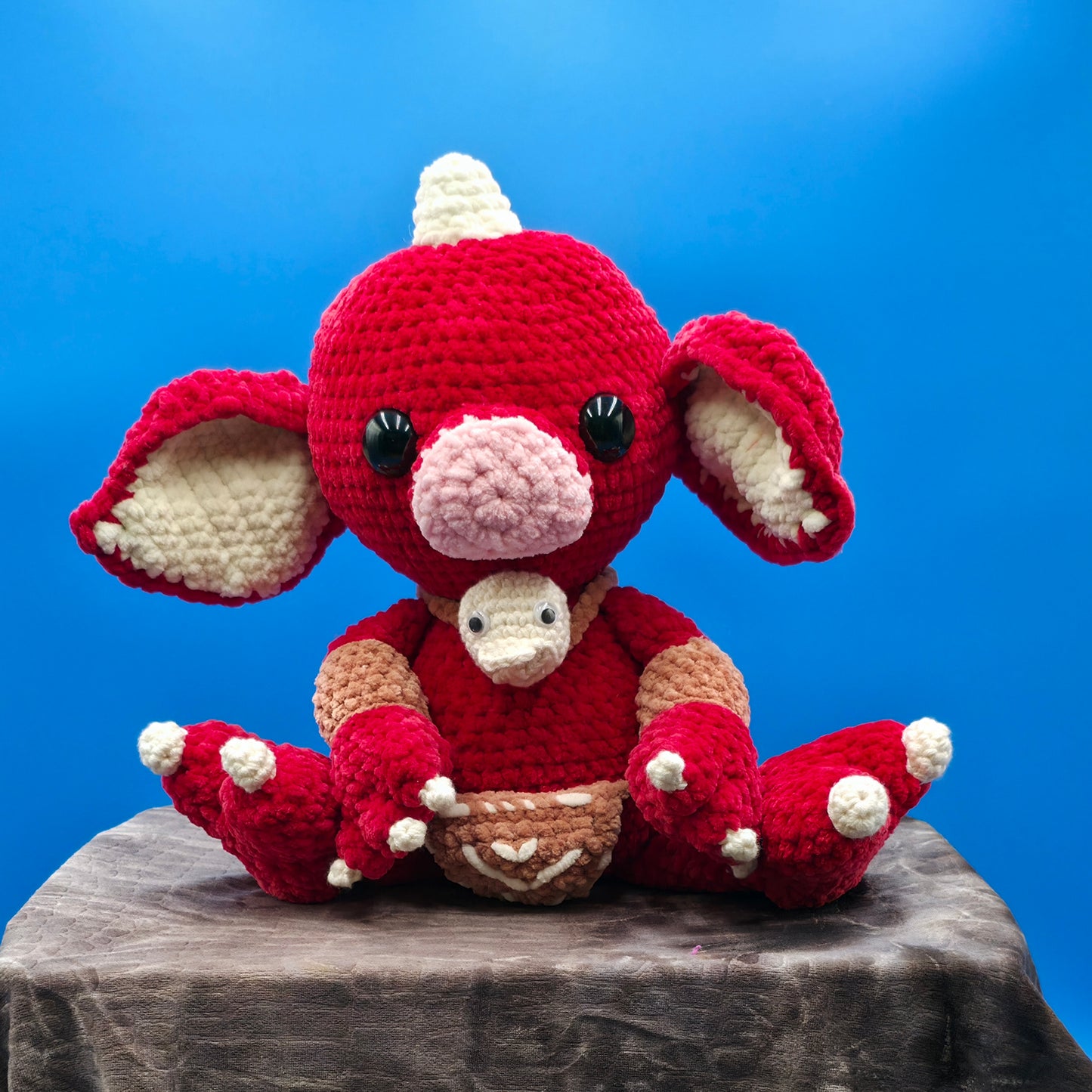 Large baby goblin doll ready for battle.