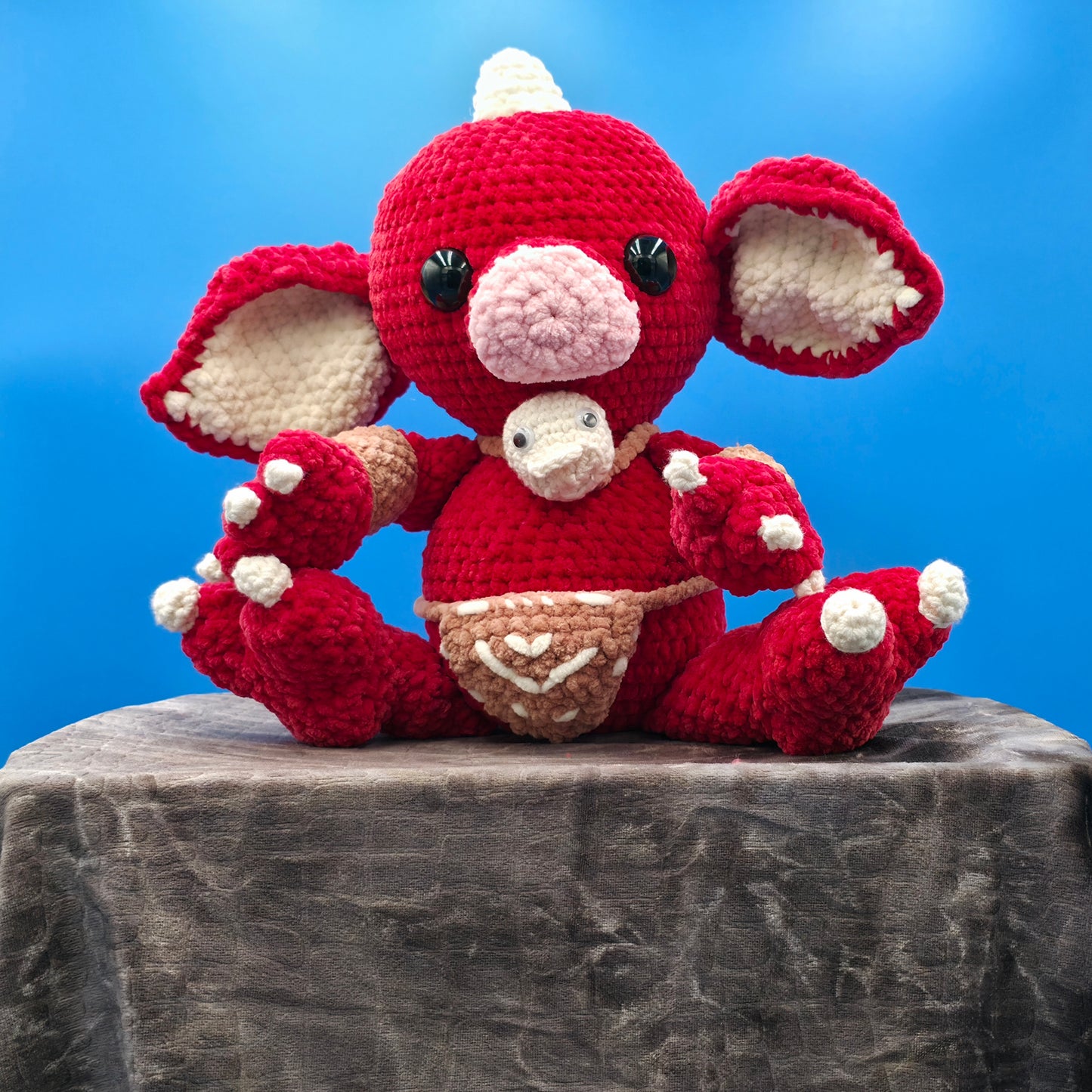 Large baby goblin doll ready for battle.