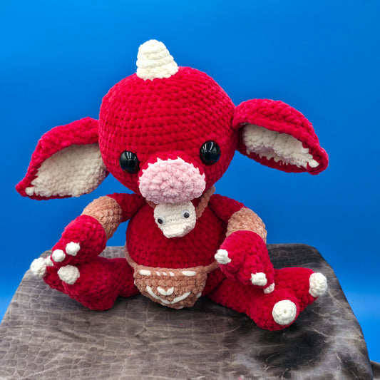 Large baby goblin doll ready for battle.